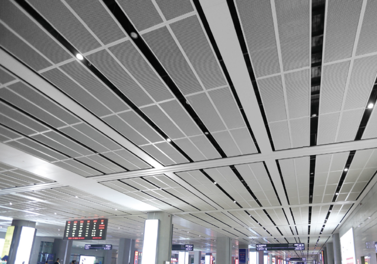 Aluminum mesh panels in white, gold, and silver finishes used for decorative fencing and screens